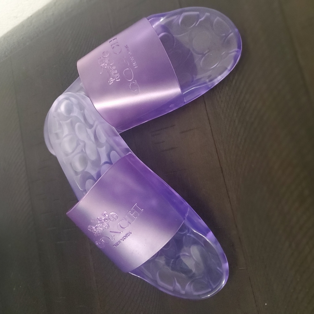 From COACH, the Ulyssa Water-Resistant Jelly Pool Slides